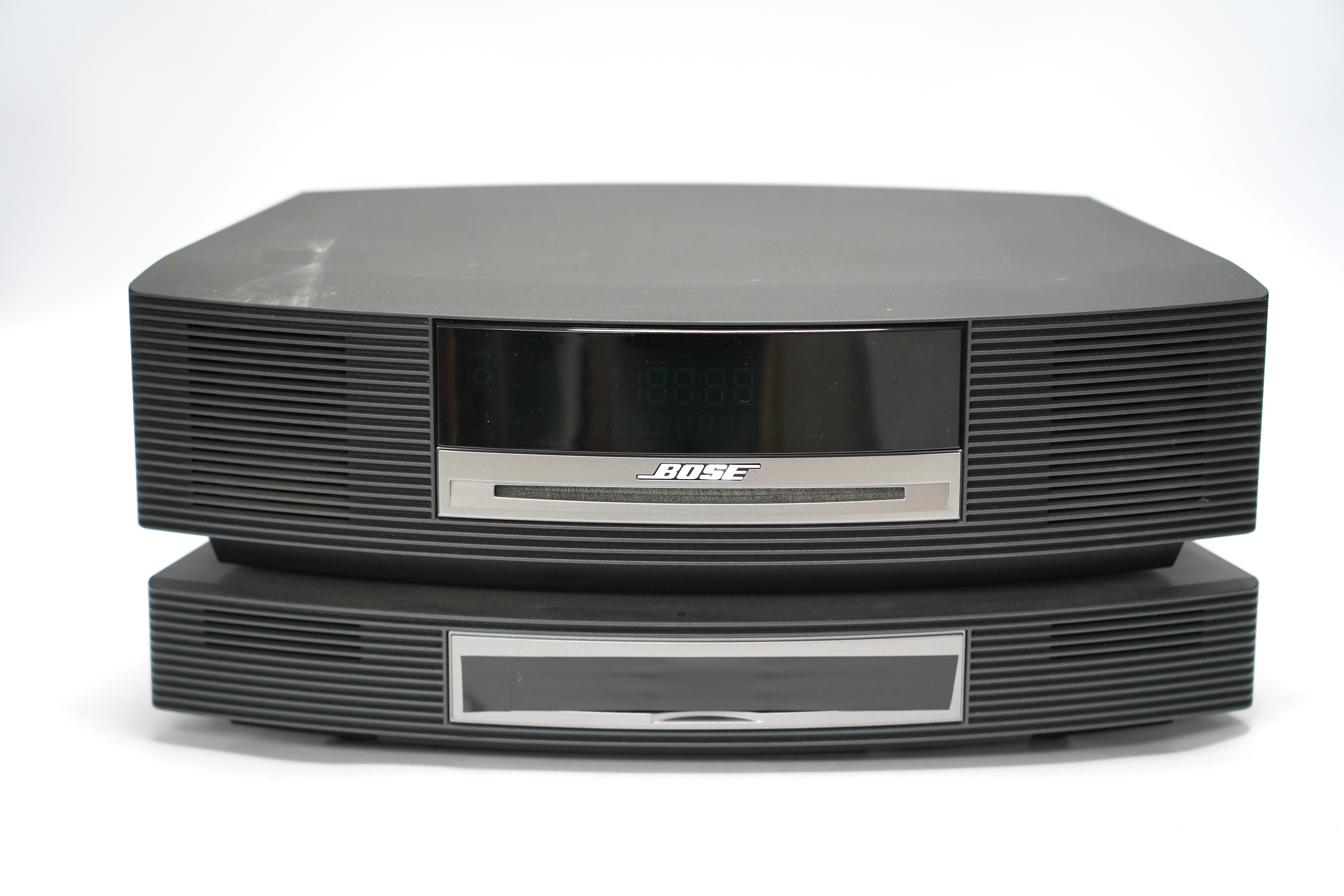 Bose Wave Music System with two remote controls and instruction booklet, etc. dated 2006